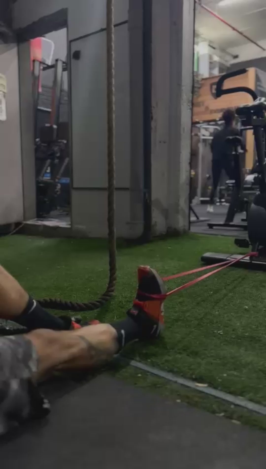 Load video: Sit with legs straight, anchor the band in front of you, and loop it around the top of your foot. Pull your toes back toward your shin, hold for 2 seconds, and slowly release.